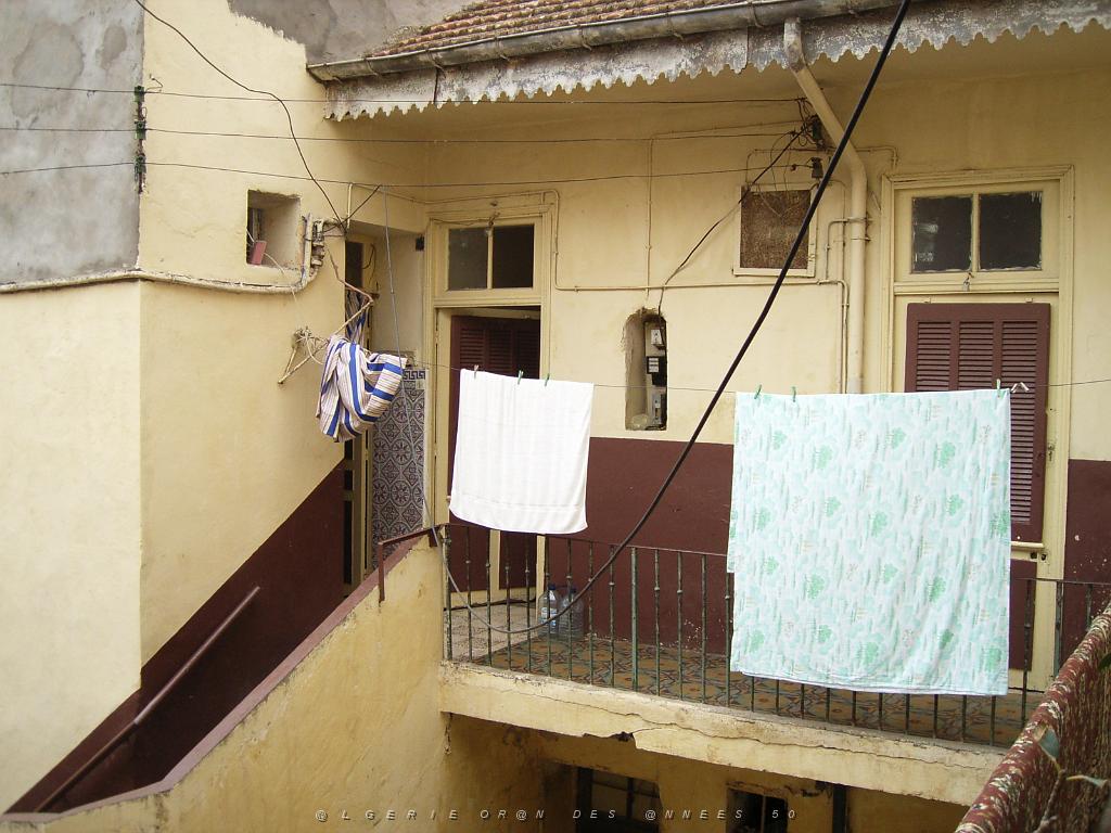 035-ORAN-Juin06-rue du 75.jpg - Unicode